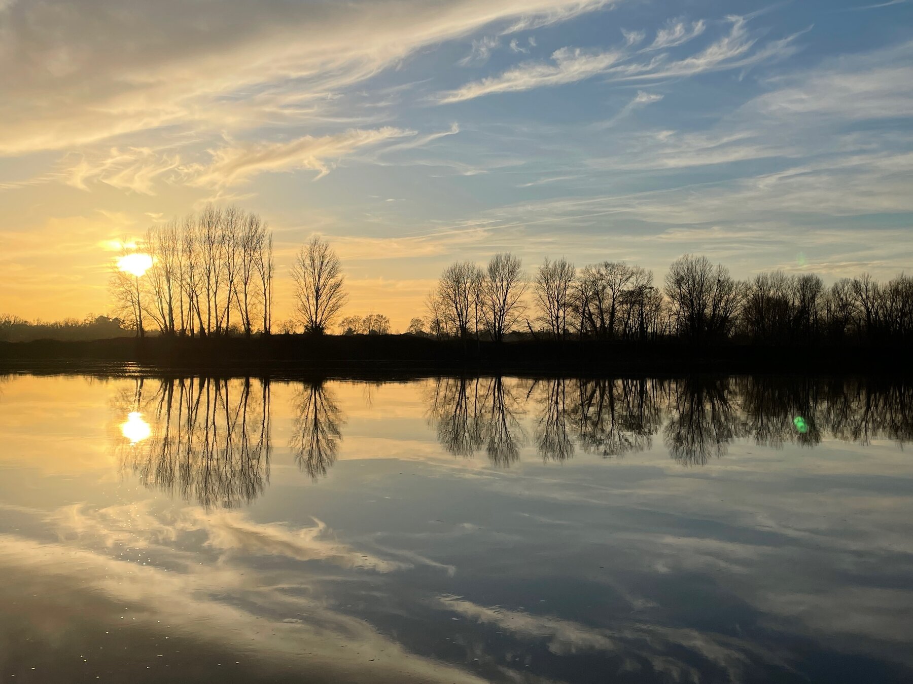 Coucher de soleil, reflets sur l'eau
